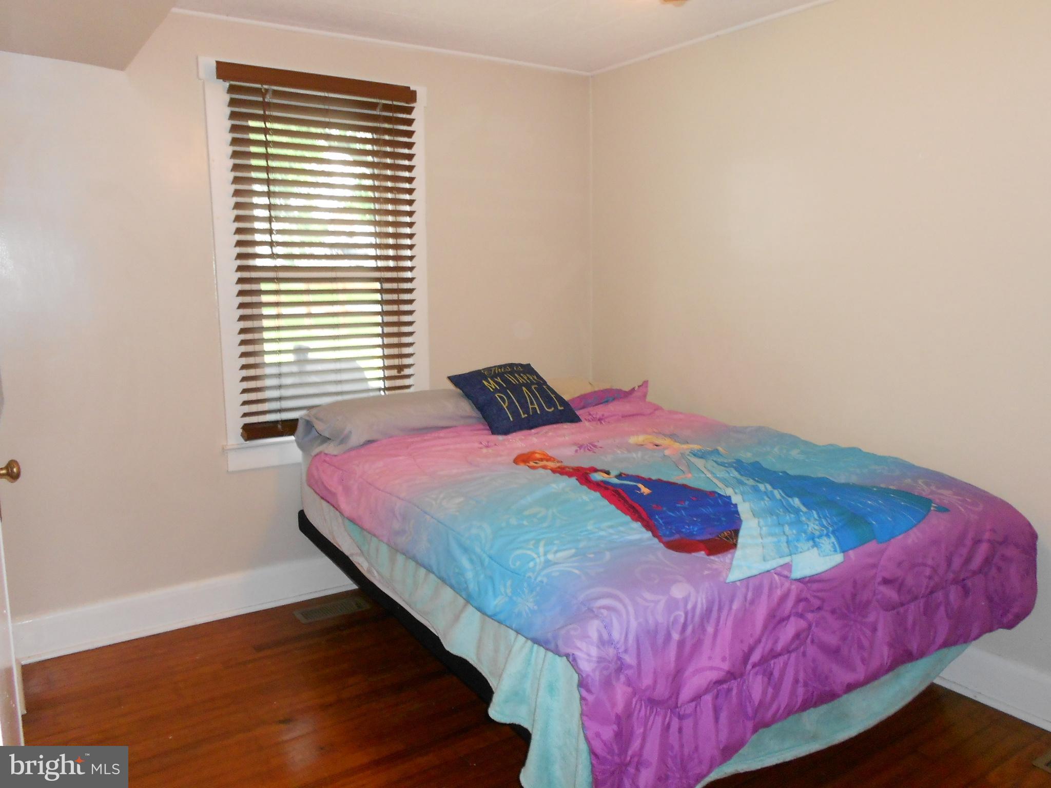 15304 Old Hanover Road Upperco, MD 21155 - Photo 15 of 36 Main floor bedroom w/hardwood floors