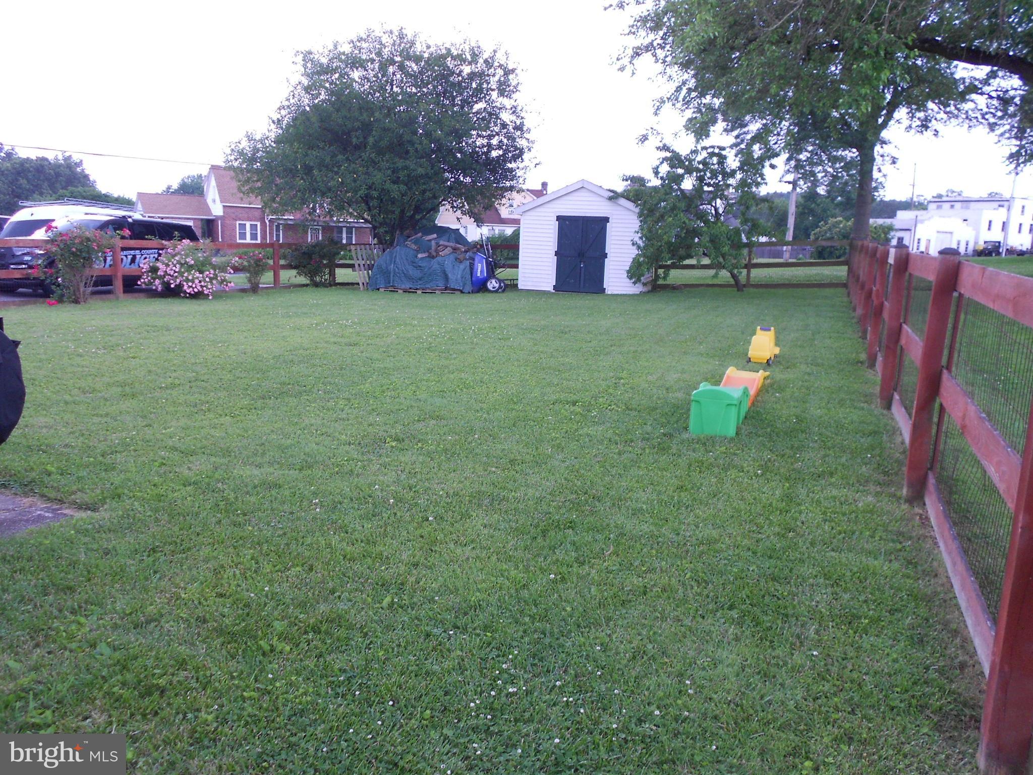 15304 Old Hanover Road Upperco, MD 21155 - Photo 29 of 36 Level backyard is fenced & has shed