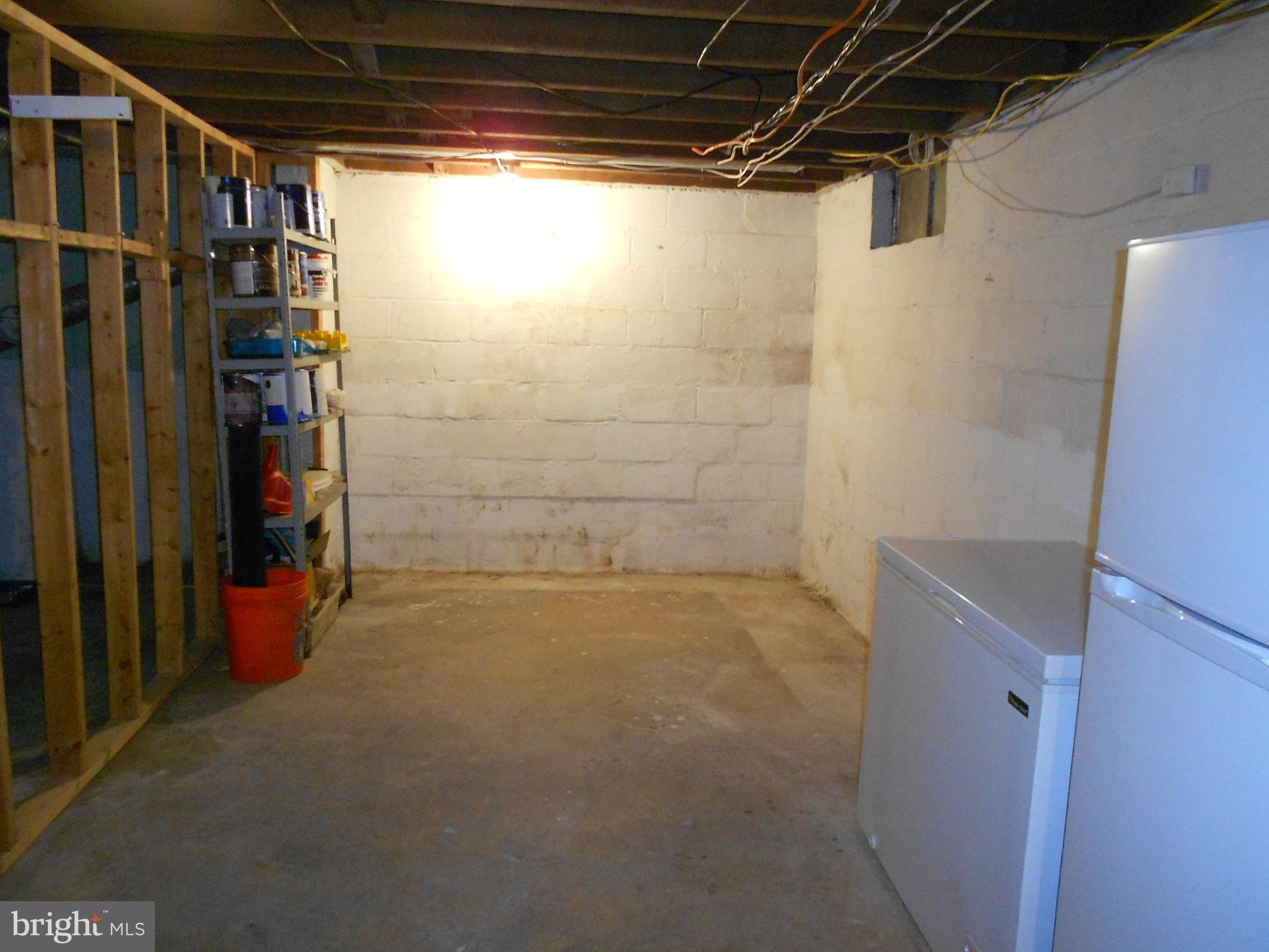 15304 Old Hanover Road Upperco, MD 21155 - Photo 35 of 36 Unfinished basement has lots of room for storage