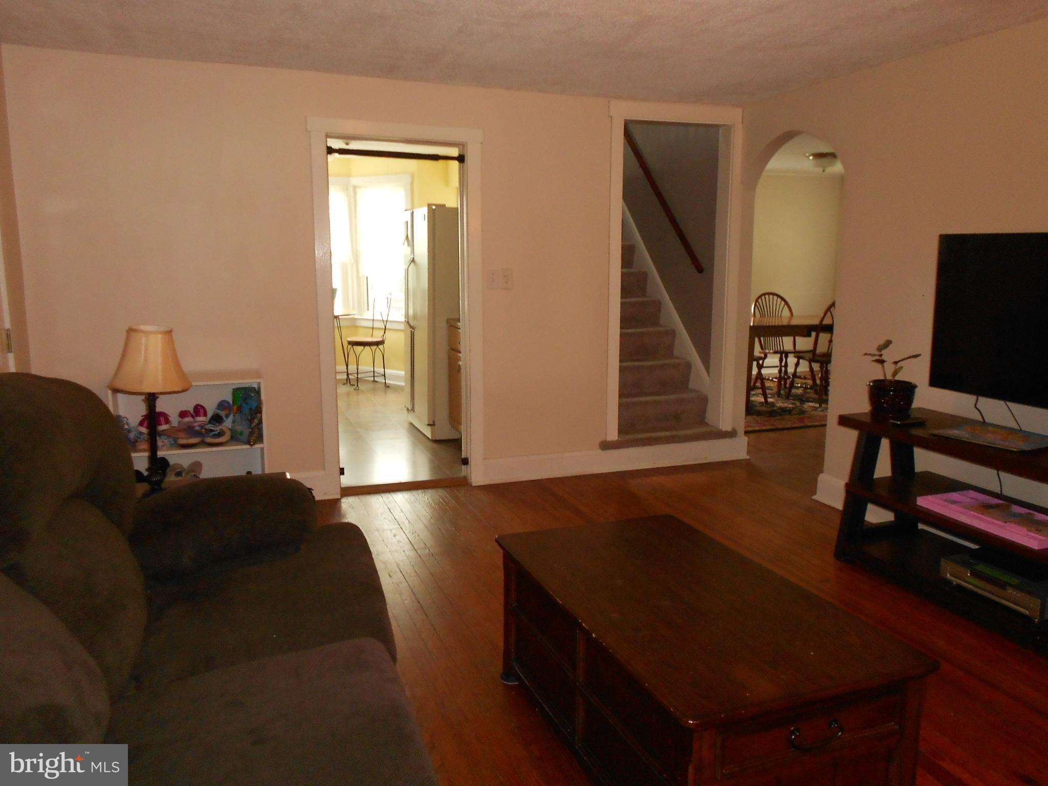 15304 Old Hanover Road Upperco, MD 21155 - Photo 6 of 36 Hardwood floors & access to kitchen & dining room