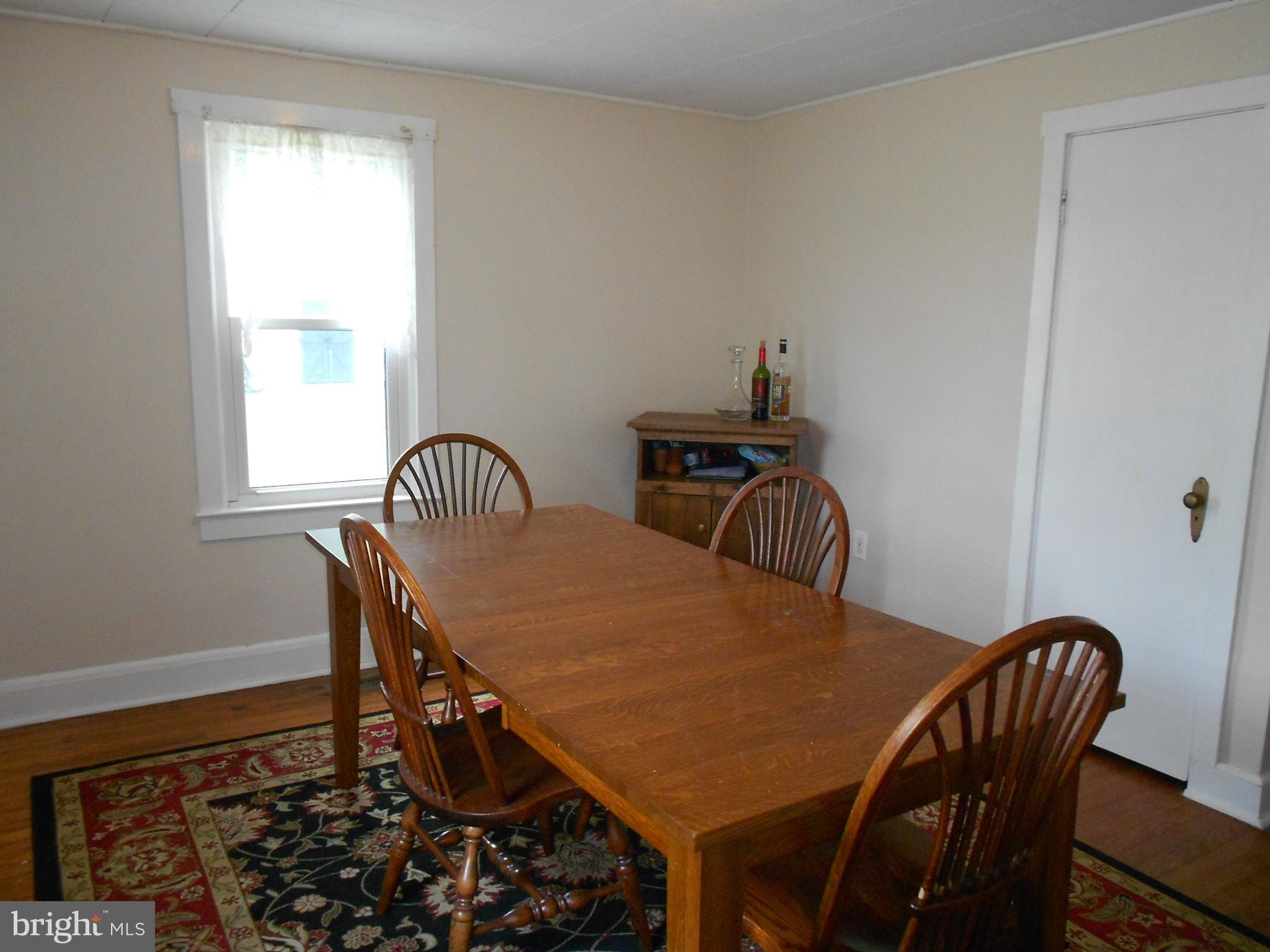 15304 Old Hanover Road Upperco, MD 21155 - Photo 8 of 36 Formal dining room w/coat closet