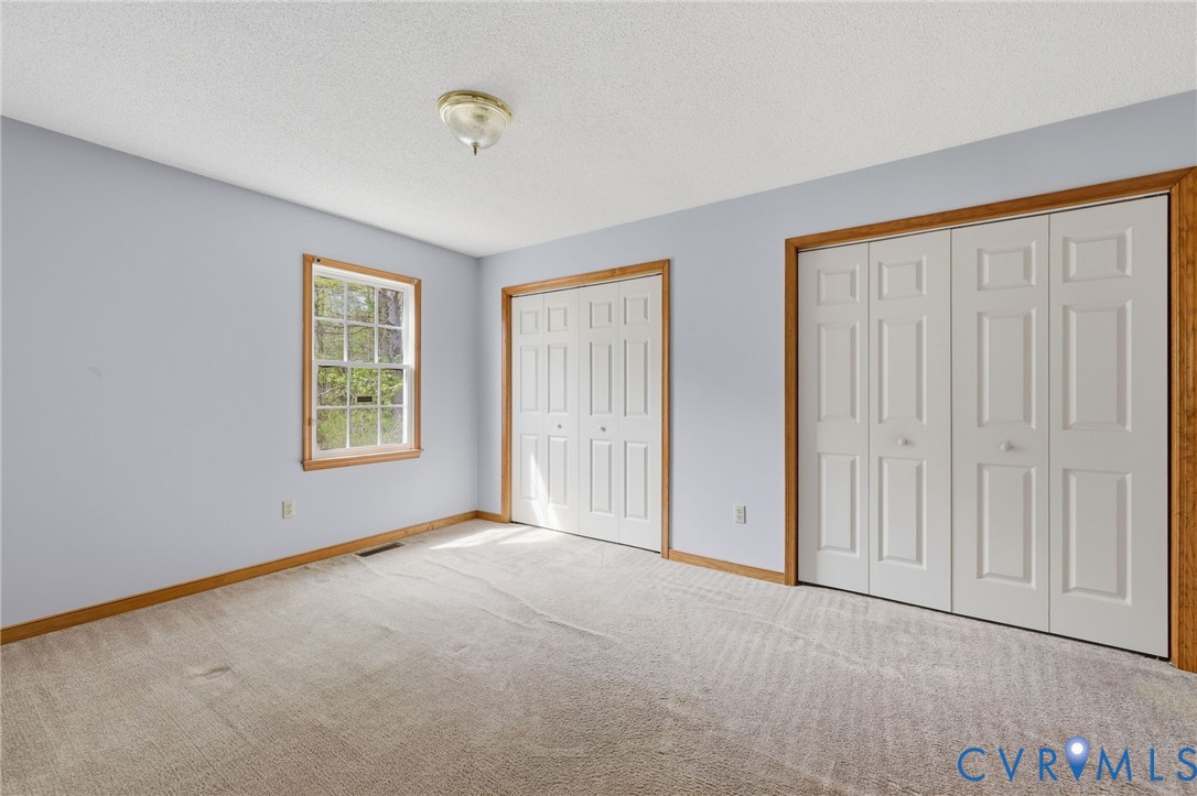 7208 Brandon Lane Prince George, VA 23875 - Photo 21 of 26 an empty room with windows