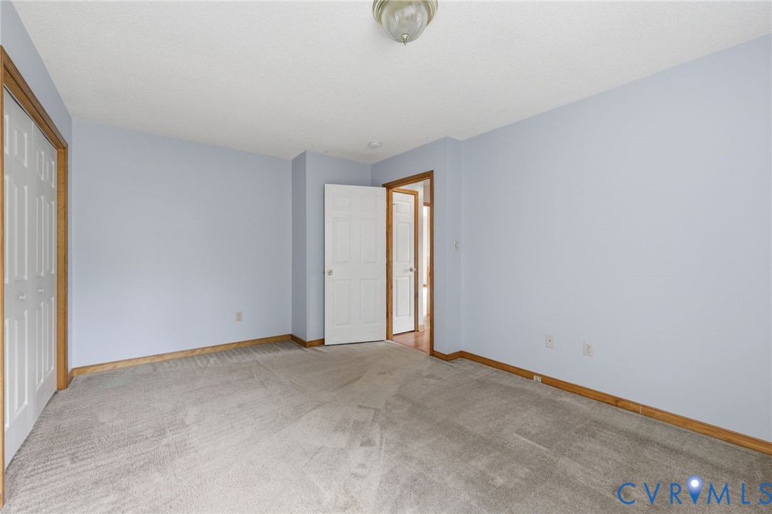 7208 Brandon Lane Prince George, VA 23875 - Photo 22 of 26 a view of an empty room with window and closet area