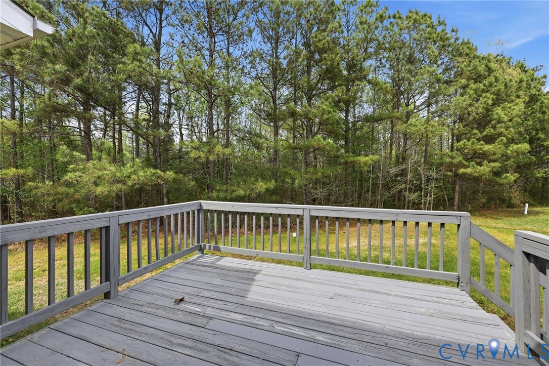 7208 Brandon Lane Prince George, VA 23875 - Photo 3 of 26 a view of deck with a large trees