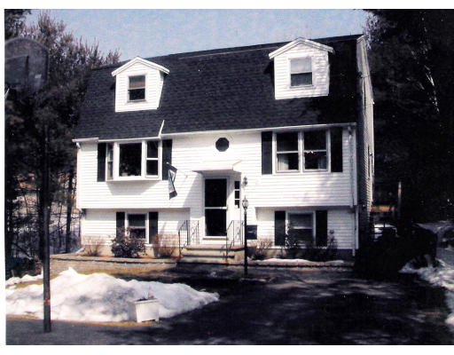 26 Gove Road Billerica, MA 01821 - Photo 1 of 8 a front view of a house with yard