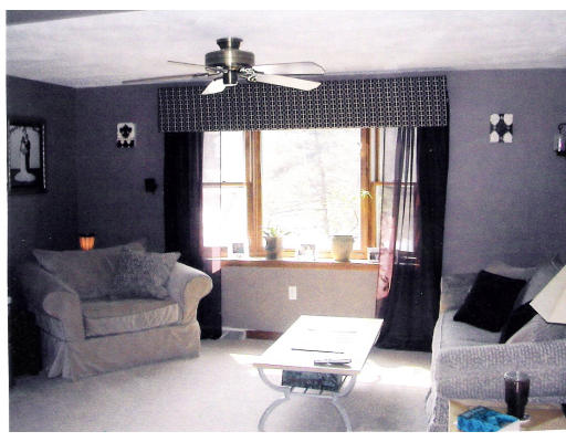 26 Gove Road Billerica, MA 01821 - Photo 4 of 8 a living room with furniture and window