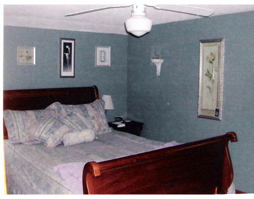 26 Gove Road Billerica, MA 01821 - Photo 6 of 8 a bedroom with bed and window