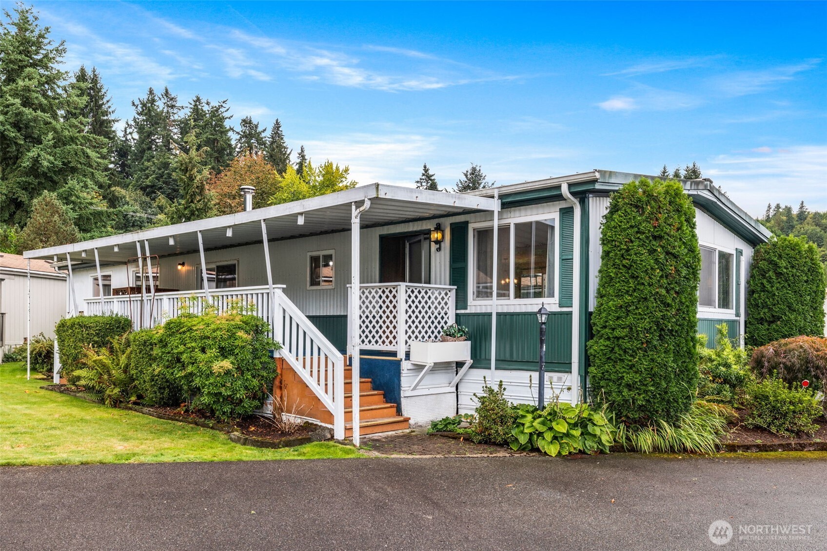 11330 East Riverside Drive, Unit 7 Bothell, WA 98011 - Photo 2 of 32 front view of a house with a porch