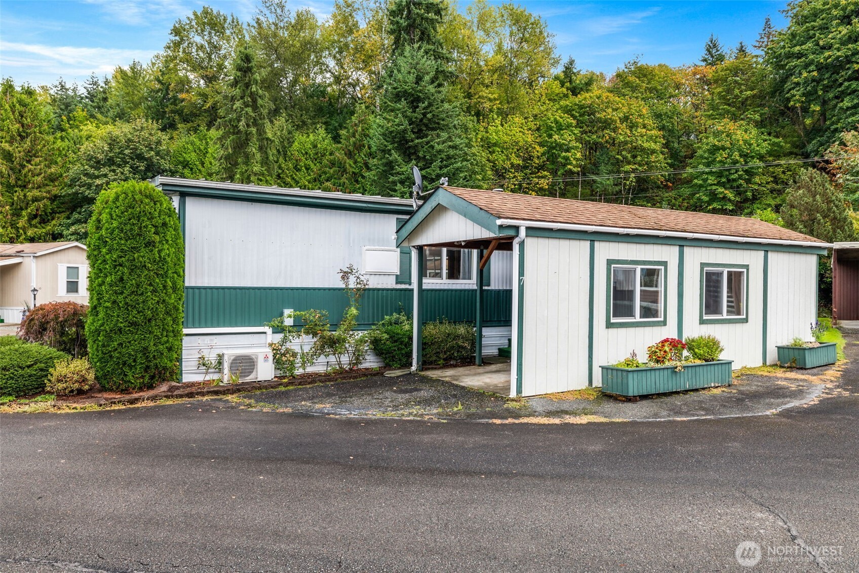 11330 East Riverside Drive, Unit 7 Bothell, WA 98011 - Photo 30 of 32 front view of a house with a patio
