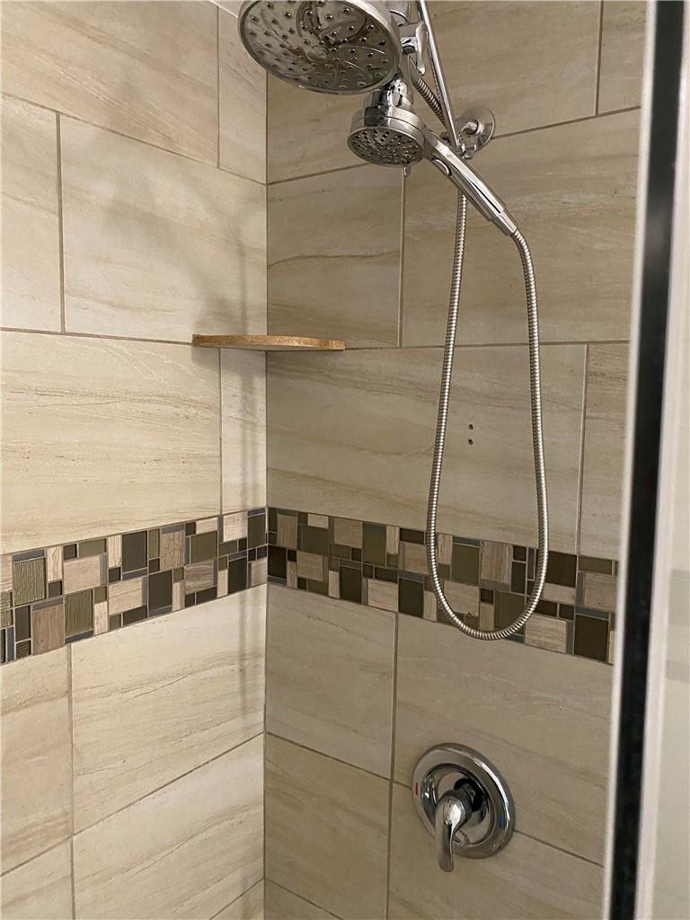 1978 Park Place Boca Raton, FL 33486 - Photo 17 of 34 a bathroom with a shower