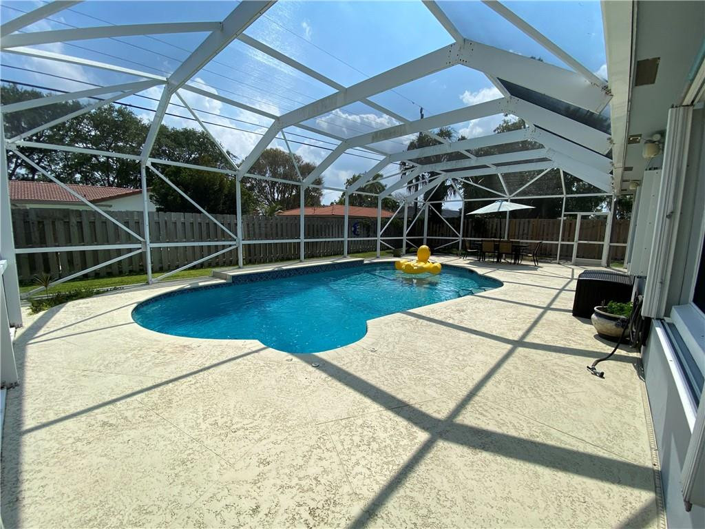 1978 Park Place Boca Raton, FL 33486 - Photo 31 of 34 a view of a room with gym equipment