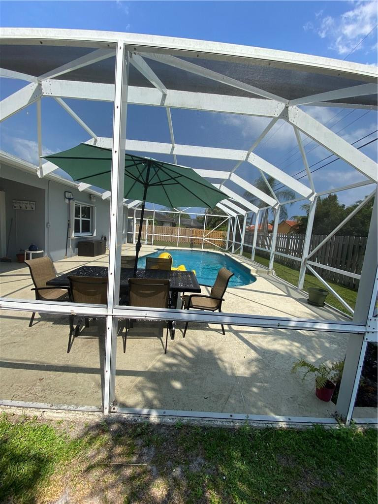 1978 Park Place Boca Raton, FL 33486 - Photo 33 of 34 a view of a chairs and table in a patio