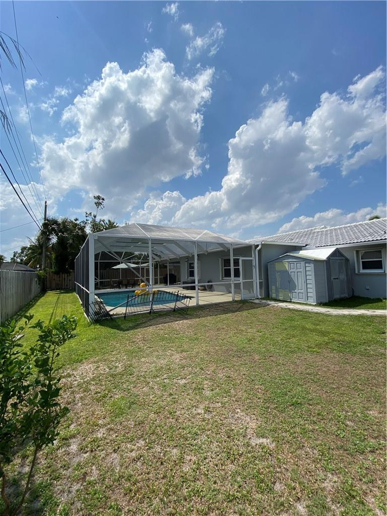 1978 Park Place Boca Raton, FL 33486 - Photo 34 of 34 a front view of a house with garden