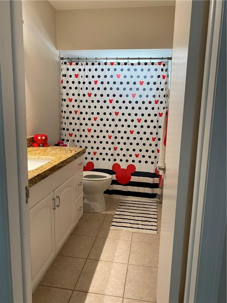 1978 Park Place Boca Raton, FL 33486 - Photo 10 of 34 a bathroom with a black white checkered floor