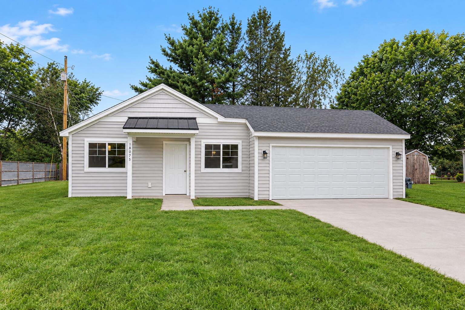 859 Merrick Street Belding, MI 48809 - Photo 1 of 14 AI edited grass