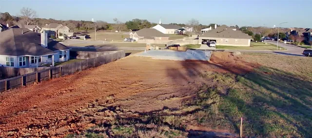 a view of a building with a street