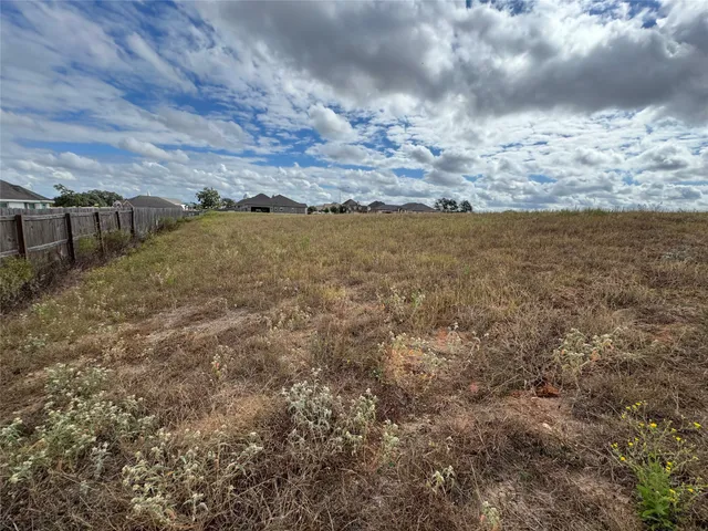 a view of a building with a street