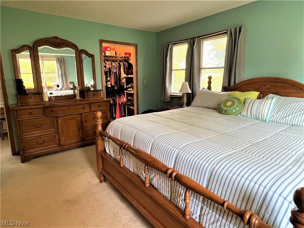 607 Bryan Road Milan, OH 44846 - Photo 15 of 34 Bedroom featuring light carpet