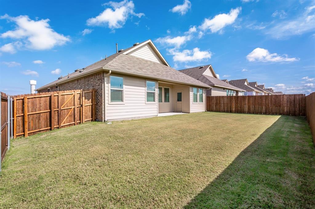 2157 Clarion Drive Forney, TX 75126 - Photo 28 of 28 a front view of a house with a yard