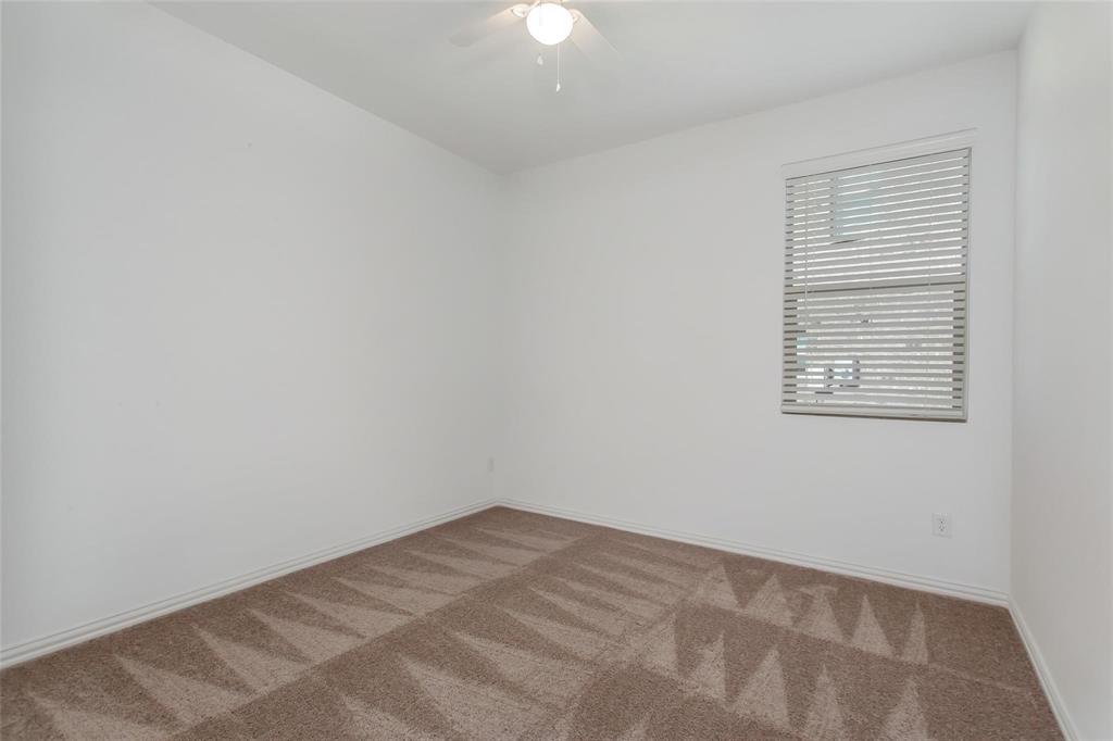 2157 Clarion Drive Forney, TX 75126 - Photo 7 of 28 an empty room with a window