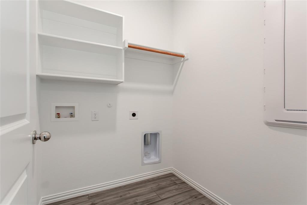 2157 Clarion Drive Forney, TX 75126 - Photo 9 of 28 a view of room with hardwood floor