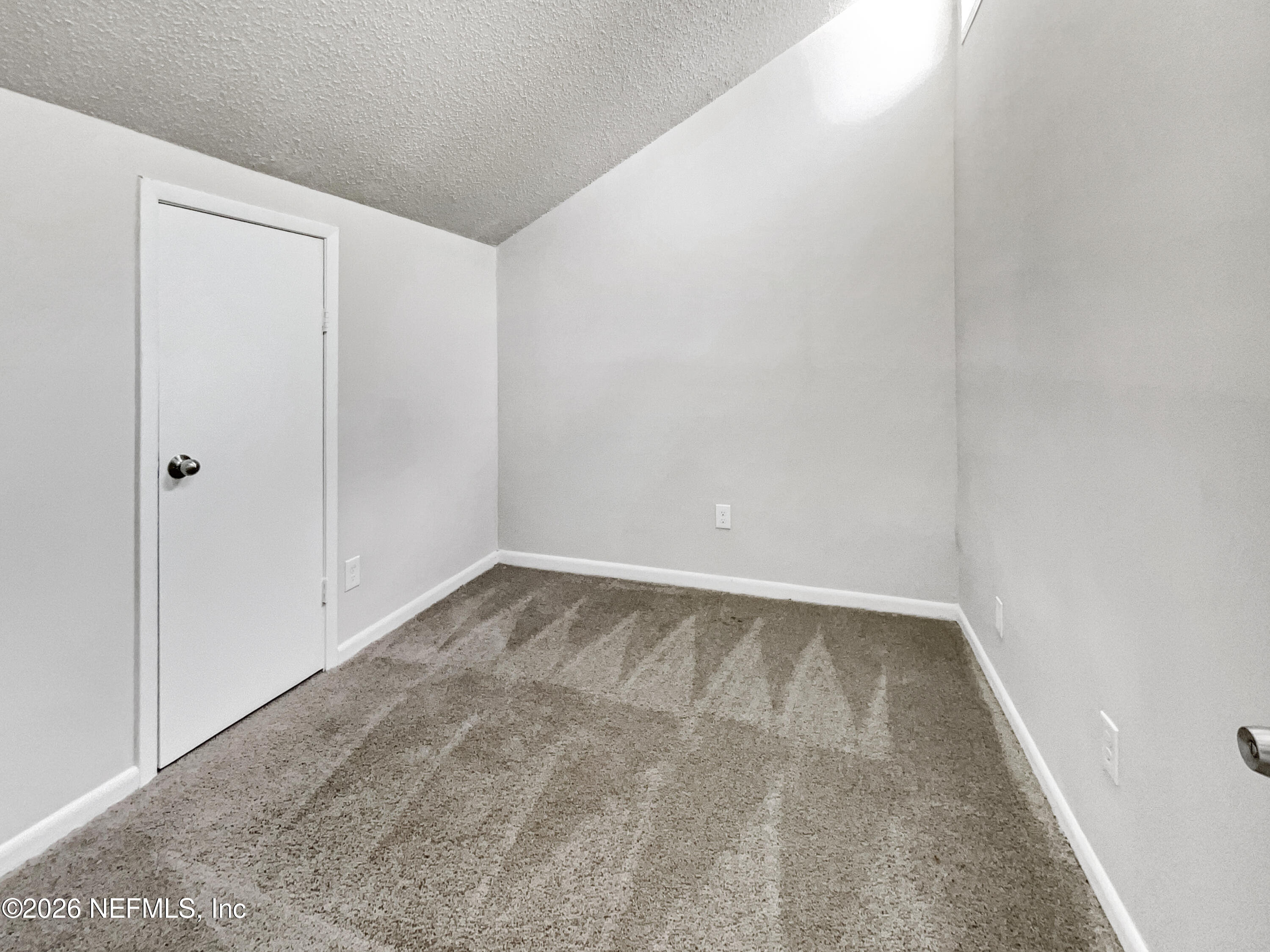 7208 Cypress Cove Road, Unit 13 Jacksonville, FL 32244 - Photo 14 of 22 a view of an empty room