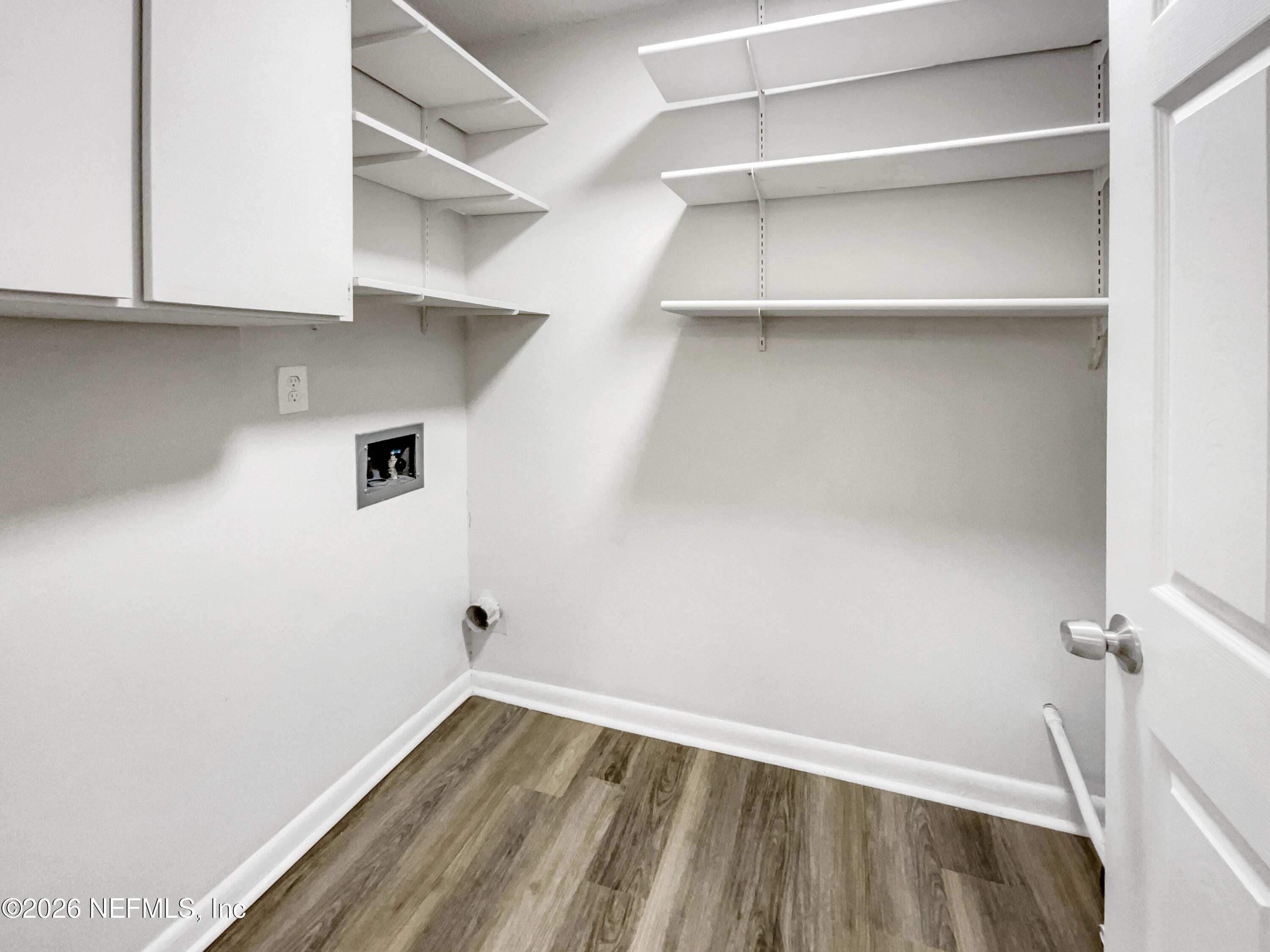 7208 Cypress Cove Road, Unit 13 Jacksonville, FL 32244 - Photo 16 of 22 a view of an empty walk in closet