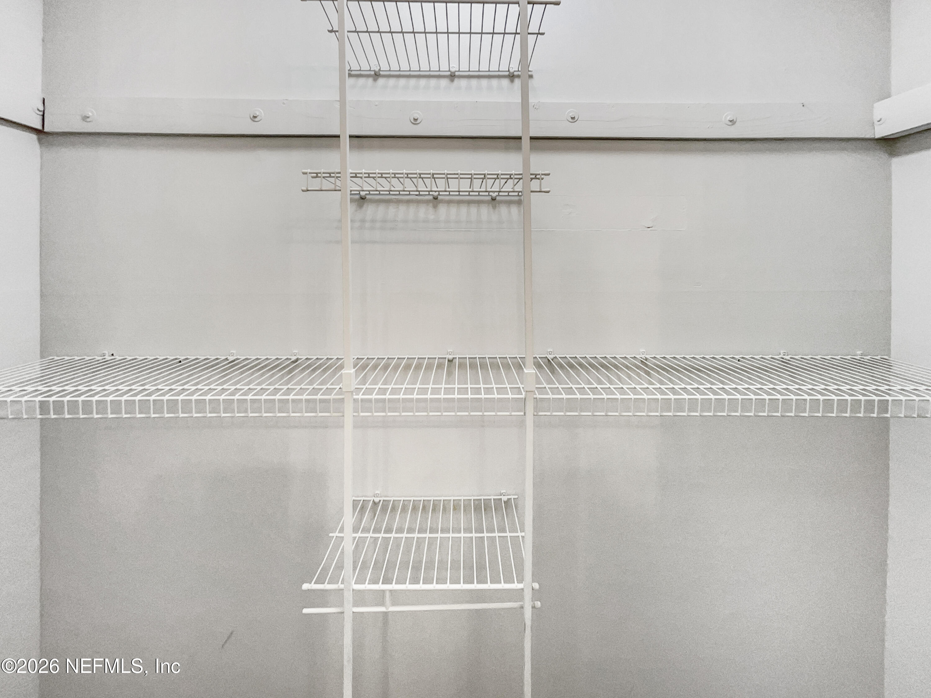 7208 Cypress Cove Road, Unit 13 Jacksonville, FL 32244 - Photo 19 of 22 a close view of a refrigerator in kitchen