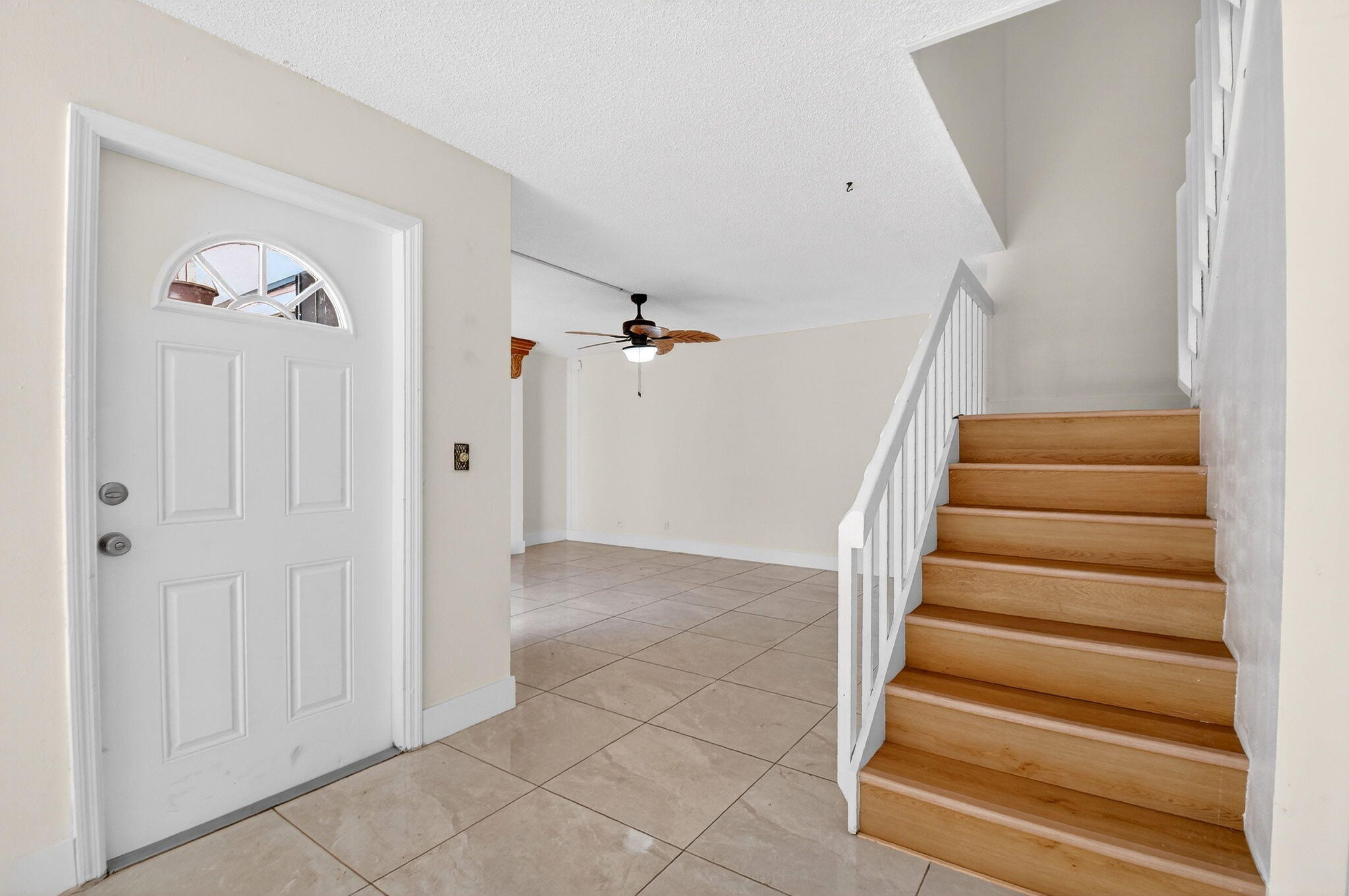 136 Woodland Road Palm Springs, FL 33461 - Photo 14 of 42 a view of an entryway with staircase