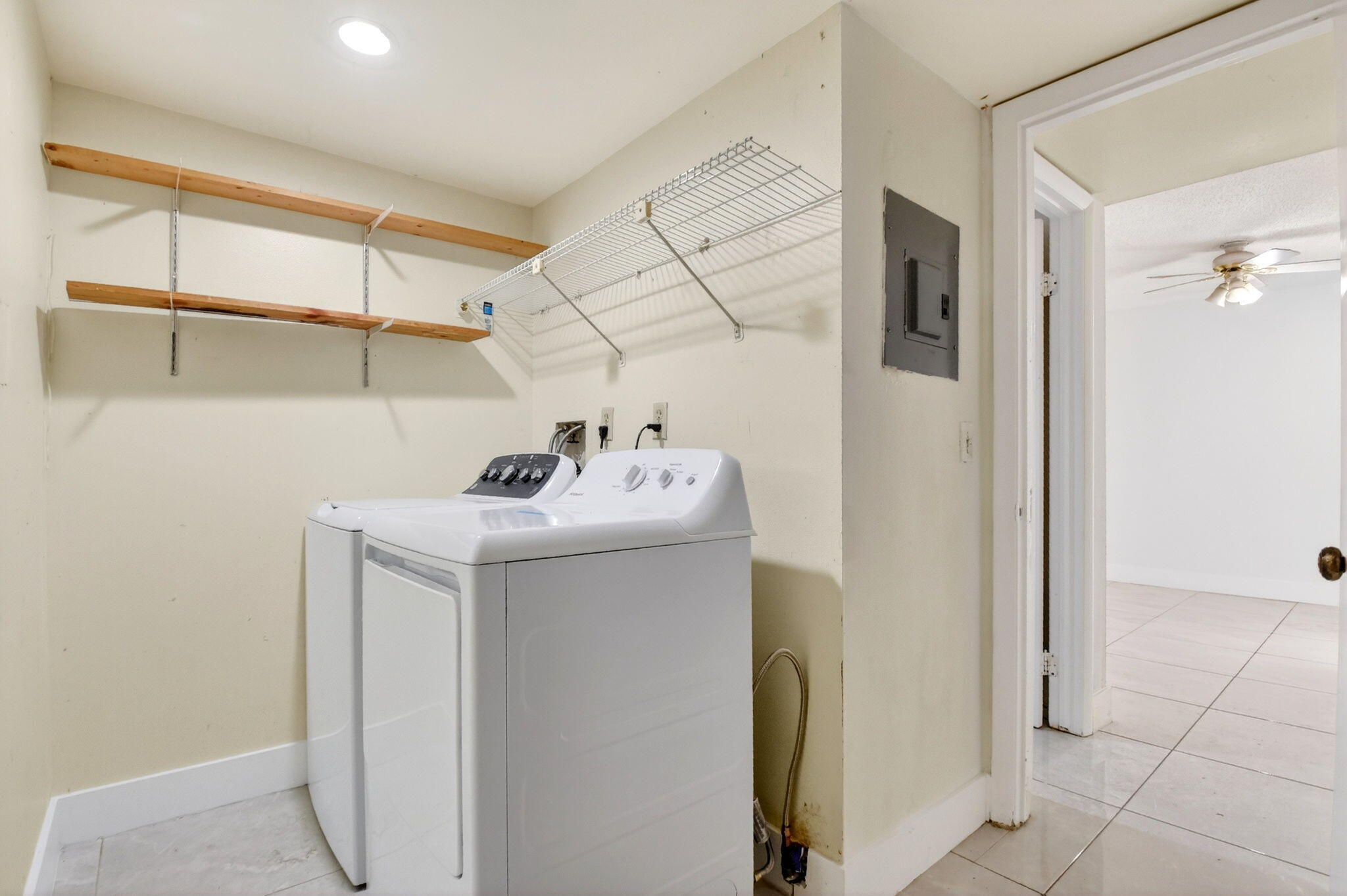 136 Woodland Road Palm Springs, FL 33461 - Photo 23 of 42 a bathroom with a sink and a mirror