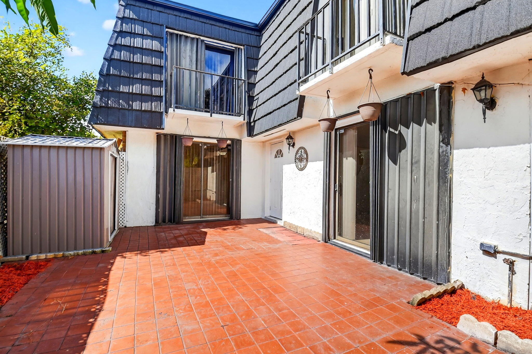 136 Woodland Road Palm Springs, FL 33461 - Photo 4 of 42 a view of a house with a door