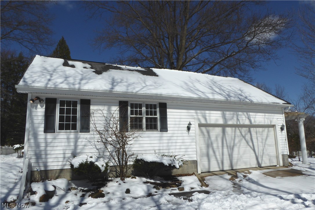 15421 Hemlock Point Road Chagrin Falls, OH 44022 - Photo 27 of 29 View of Attached Two Car Garage with Paved Driveway.