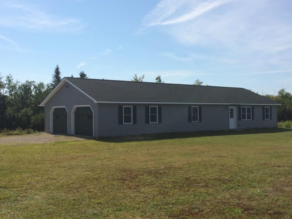 429 Sherman Road Robbinston, ME 04671 - Photo 2 of 34 Front view showing attached 2-car...