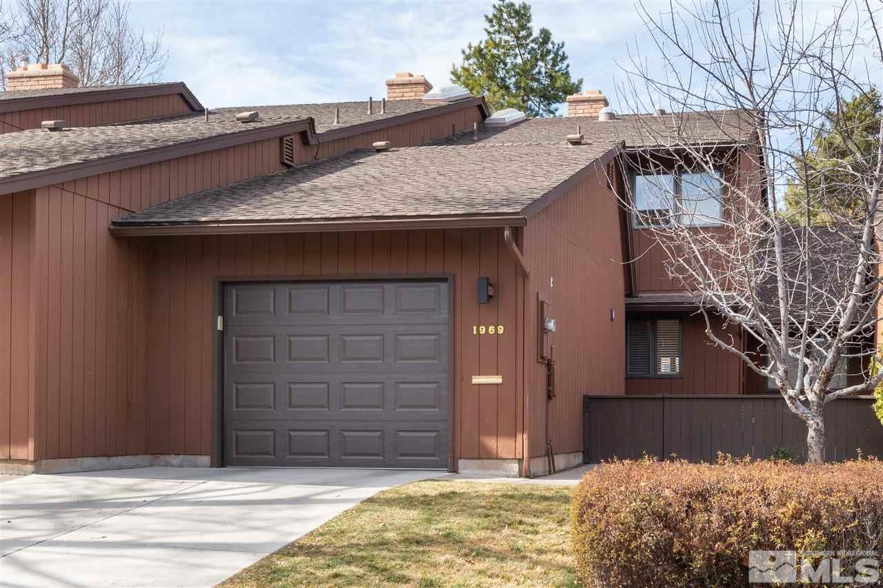 1969 South Villa Way Reno, NV 89509 - Photo 1 of 25 a front view of a house with a yard