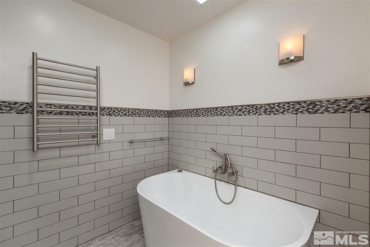 1969 South Villa Way Reno, NV 89509 - Photo 18 of 25 a bathroom with a shower