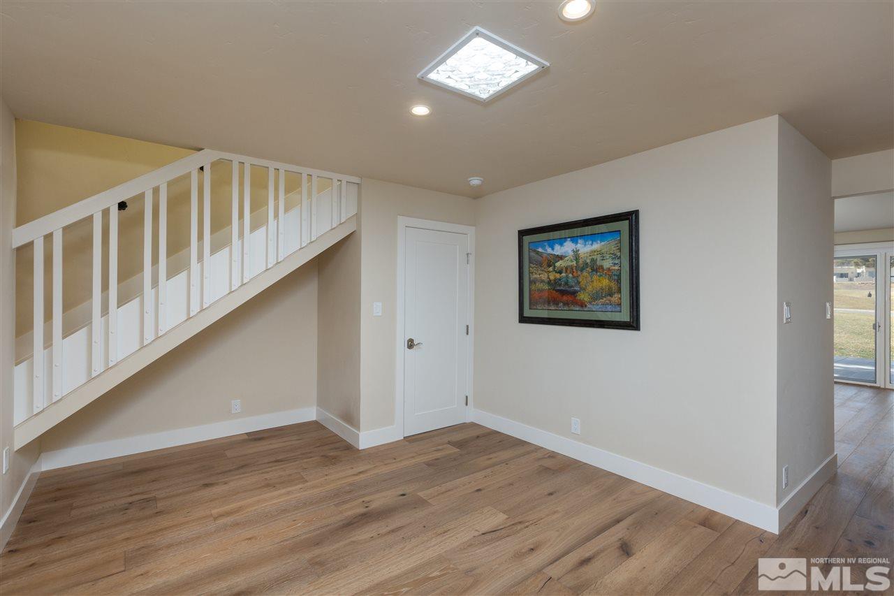 1969 South Villa Way Reno, NV 89509 - Photo 6 of 25 a view of an empty room with wooden floor