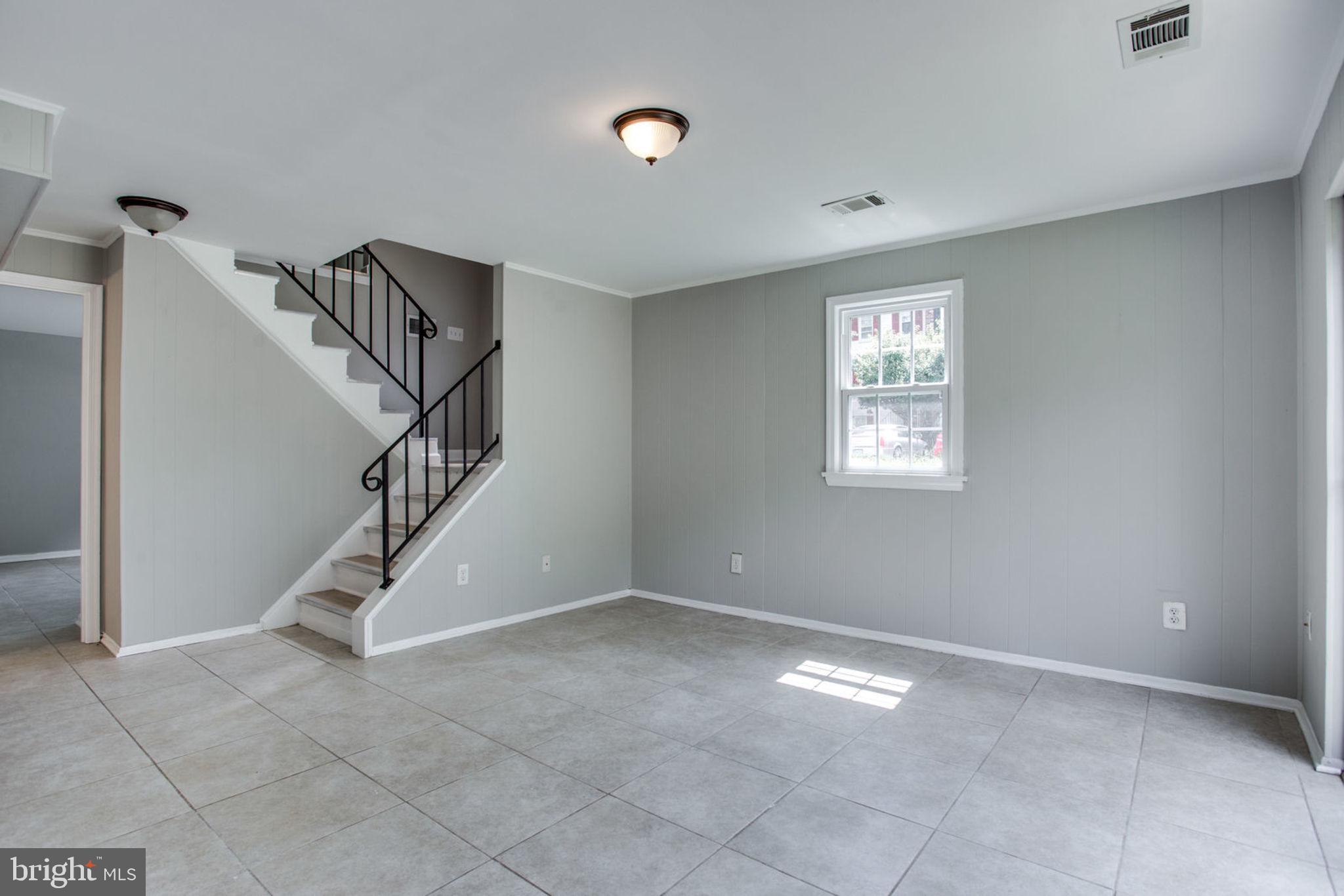 1615 Colonial Way Frederick, MD 21702 - Photo 34 of 42 Sunlight filled Basement Recreation Area