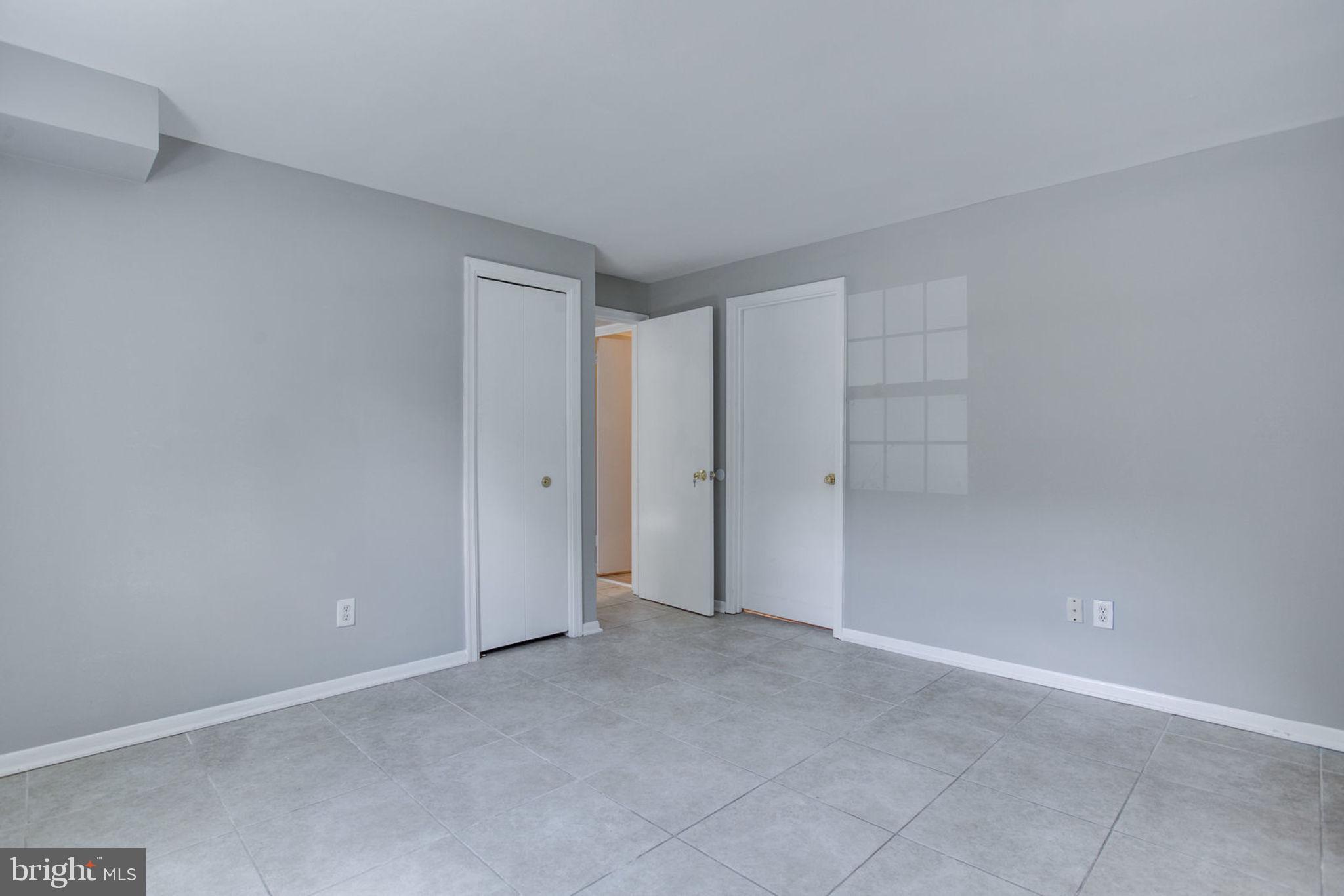 1615 Colonial Way Frederick, MD 21702 - Photo 39 of 42 Large Basement Bedroom with renovated full bath