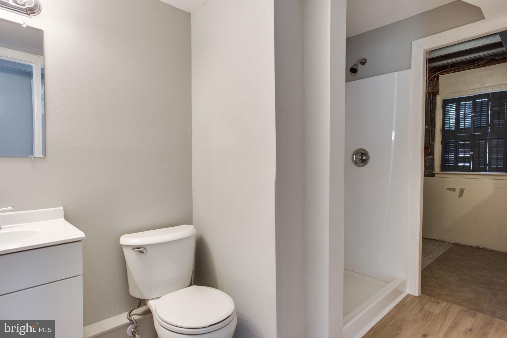 1615 Colonial Way Frederick, MD 21702 - Photo 42 of 42 New Standing Shower with New Wood Floor