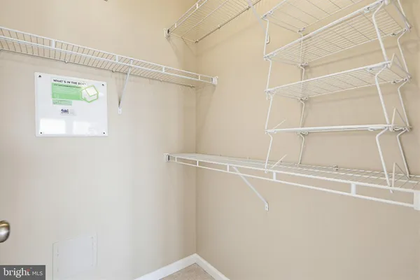 a view of a room with racks on the wall