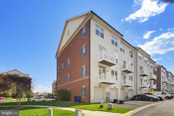 a view of a building with a yard