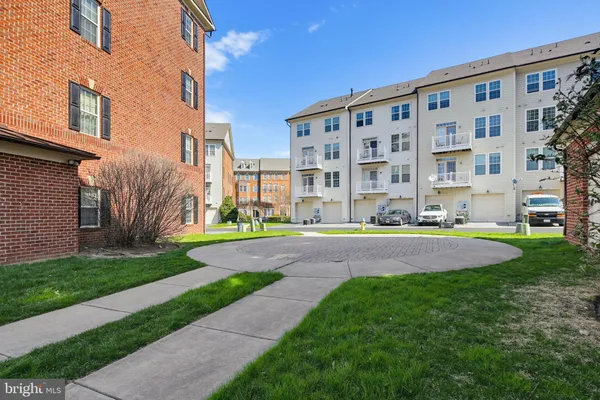 a view of street with parked cars
