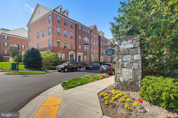a front view of a building with a street