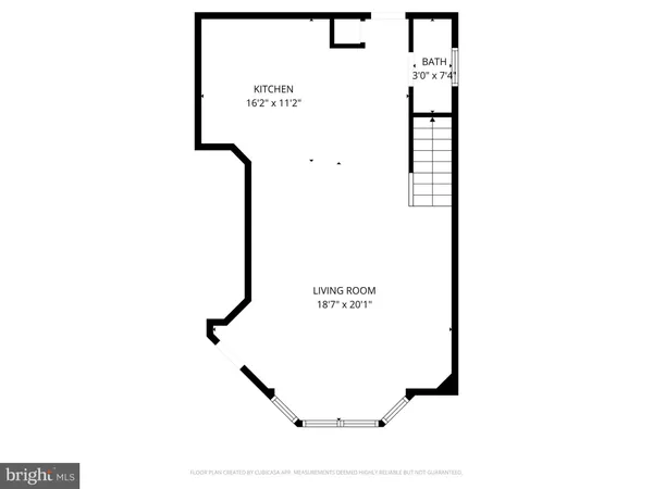 a picture of a bench in front of gate