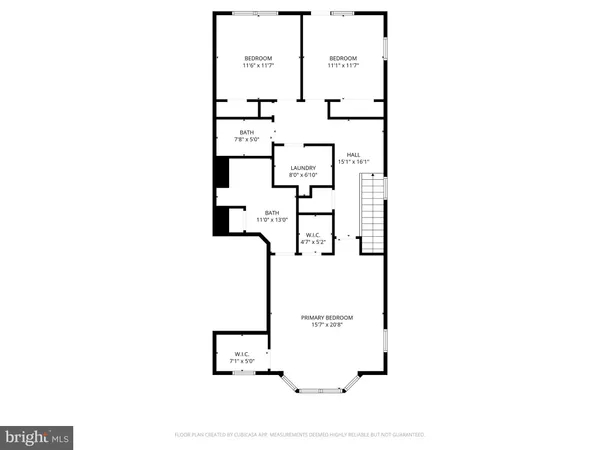 a view of a two chairs and table in the garden