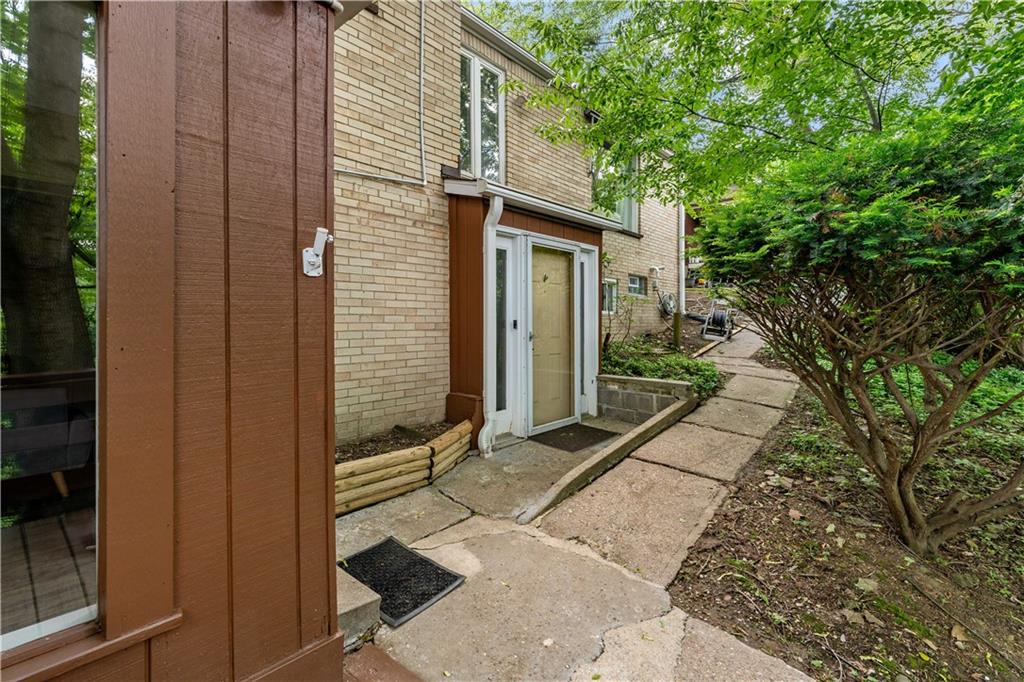 231 Woodside Road Pittsburgh, PA 15221 - Photo 1 of 34 a view of a house with a backyard