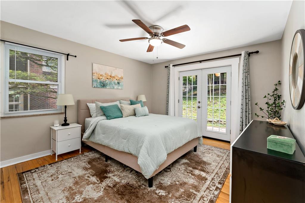 231 Woodside Road Pittsburgh, PA 15221 - Photo 12 of 34 a bedroom with a bed and window