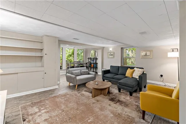 a living room with furniture and a window