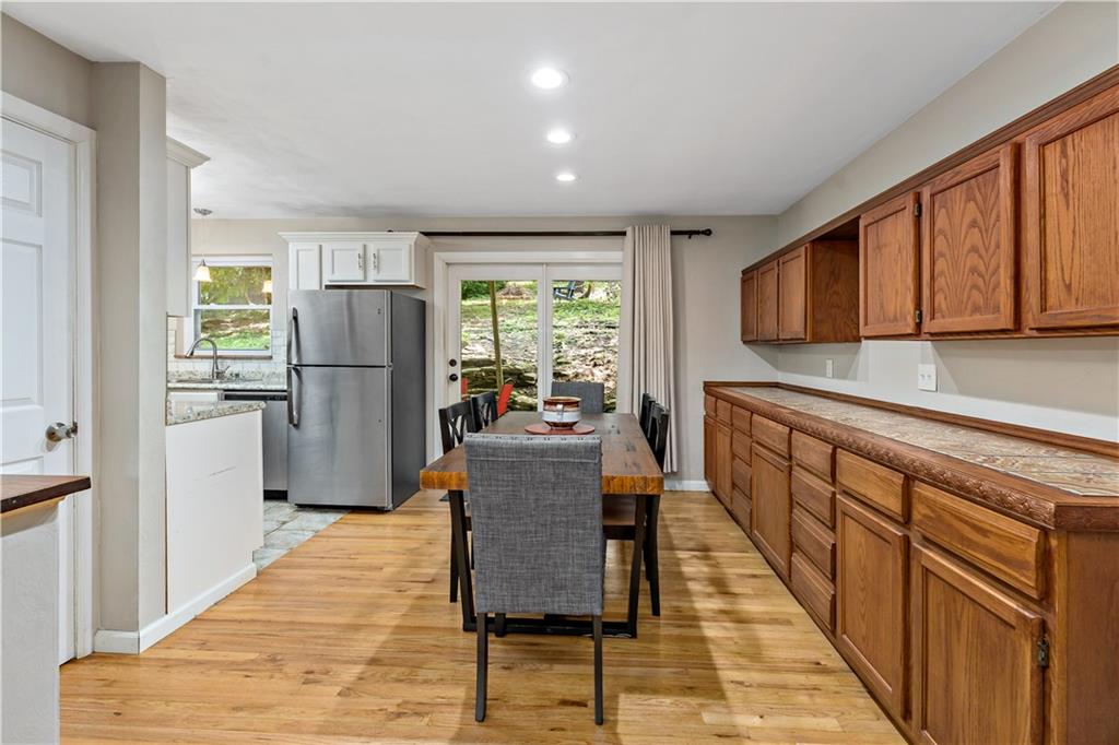 231 Woodside Road Pittsburgh, PA 15221 - Photo 7 of 34 a kitchen with refrigerator and cabinets