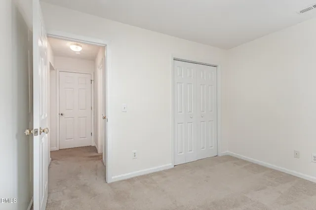 an empty room with a elevator